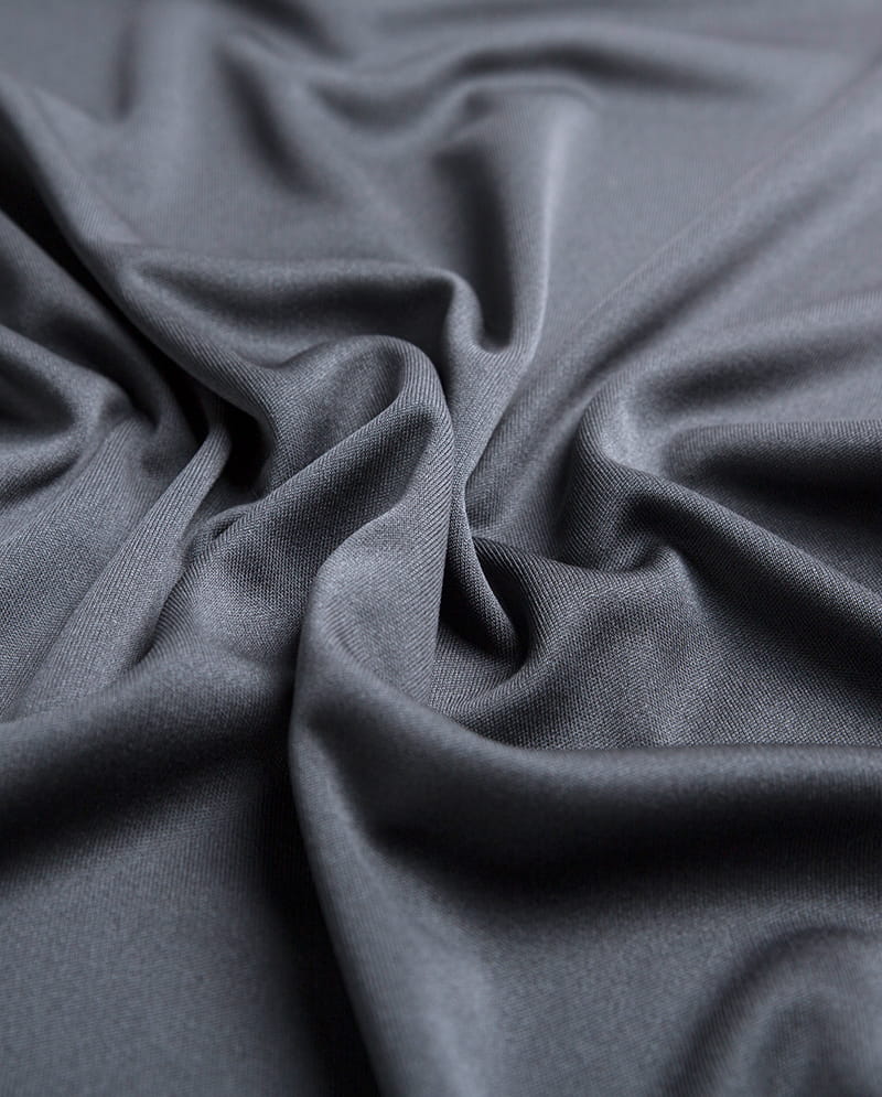 Peregangan dan elastisitas kain rajutan: Mengapa cocok untuk aplikasi pakaian olahraga dan pakaian aktif?